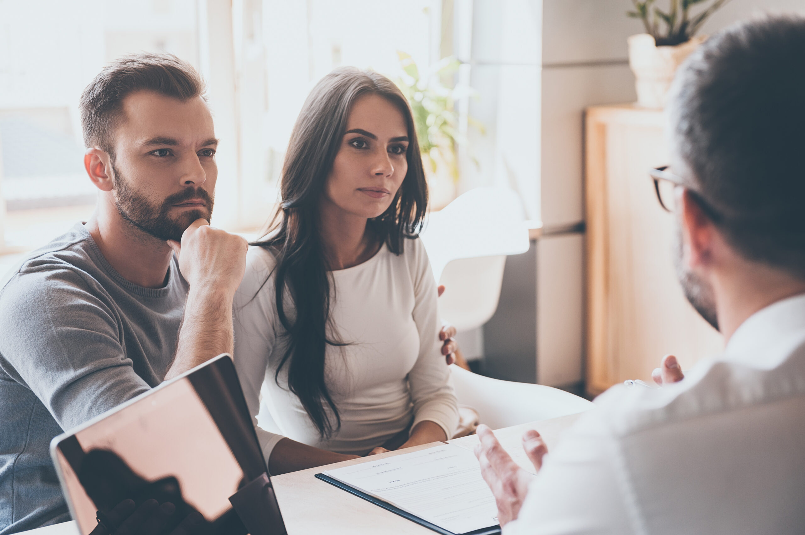 Listening,To,Financial,Advisor.,Concentrated,Young,Couple,Bonding,To,Each Listening,To,Financial,Advisor.,Concentrated,Young,Couple,Bonding,To,Each